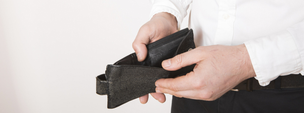bankruptcy_business_person_holding_an_empty_wallet_man_showing_the.jpg
